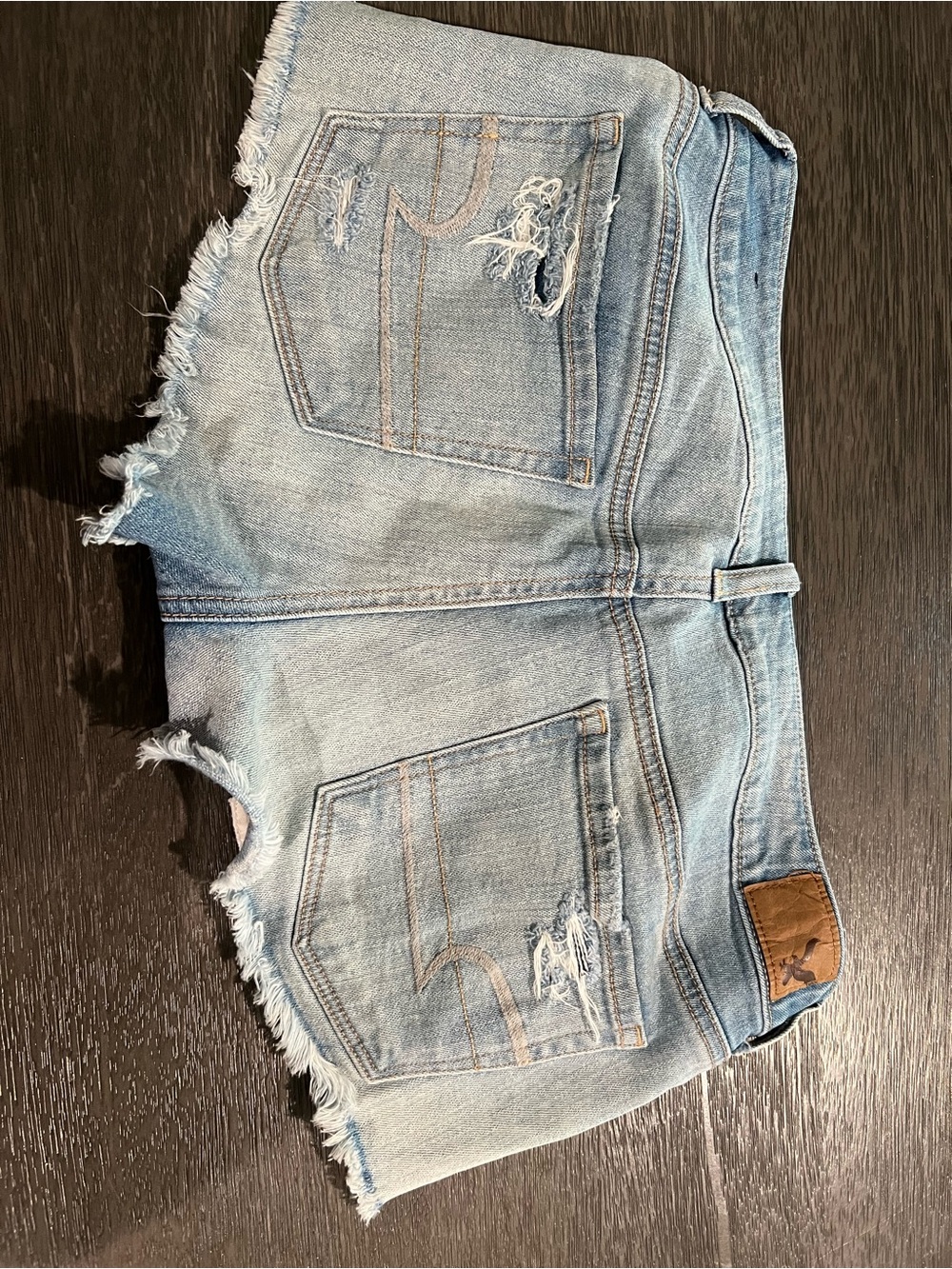 American Eagle Outfitters Light Wash Distressed Denim Shorts with Lace Panels - Picture 2 of 4